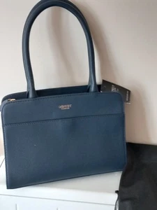 BRAND NEW OSPREY NAVY GRAINY HIDE 'TILLY' GRAB BAG WITH PRETTY COLOURFUL LINING. - Imagen 1 de 15
