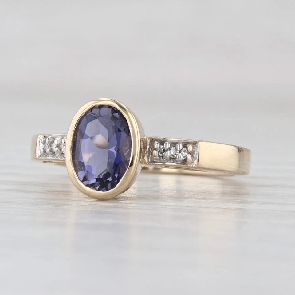 Anillo solitario de diamantes de iolita ovalado de 1,42 quilates de oro amarillo de 14 k talla 7 bisel Foto 1 de 4
