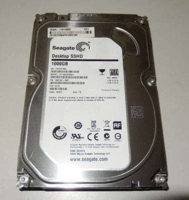 Seagate ST1000DX001 SSHD 1TB 7200U/min 64MB CACHE SATA III 3.5" -GEBRAUCHT- - Bild 1 von 2