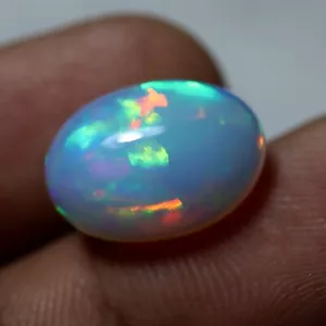 6.6 Carat 17x12.3 MM mm Natural AAAA Rainbow Fire Ethiopian White Opal Cabochons - Picture 1 of 7