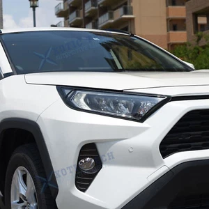 Borde decorativo superpuesto de faros de aspecto de carbono 2 piezas para Toyota RAV4 2019-25 - Imagen 1 de 11