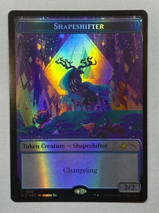 MTG - Secret Lair: Everyone's Invited - Shapeshifter (#1906) - FOIL Token - Bild 1 von 2