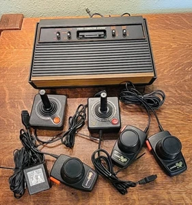 Atari 2600 Four Switch Woodgrain Console w/5 Controllers & Power Adapter - Picture 1 of 15