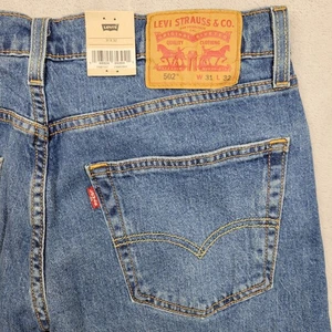 Levis 502 Jeans Mens 31x32 Blue Denim Taper Stretch Pants Light Flex Waterless - Picture 1 of 9