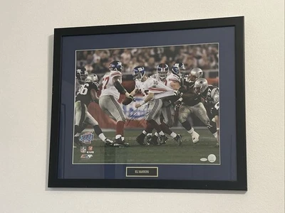 Signed and Authenticated Eli Manning New York Giants Super Bowl  22x26 Picture - Image 1 of 3