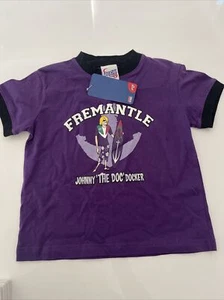 Fremantle Dockers AFL Johnny ‘The Doc’ Dockers Mascot Kids T-shirt Size 2 NWT - Picture 1 of 4