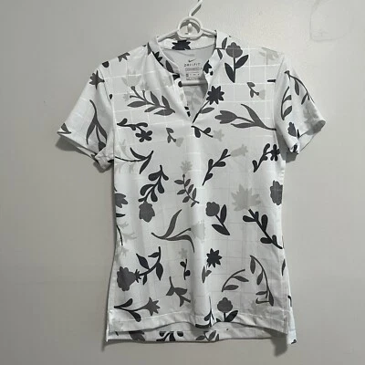 Camisa de golf Nike blanca floral cuello con muescas manga corta talla XS Foto 1 de 4