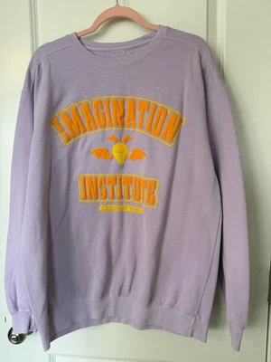 Purple dragon puffy letter Imagination Institute Sweatshirt - Image 1 of 3