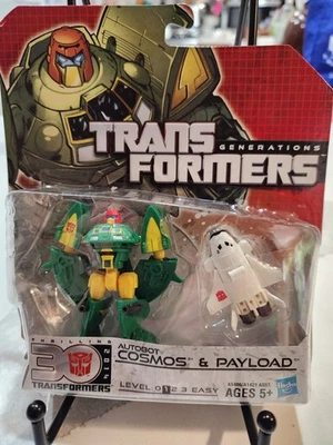 Transformers Generations Emocionante 30 Leyendas Clase Cosmos y Carga útil Sellado Foto 1 de 2
