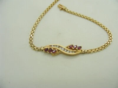 14k Yellow Gold Woman's Bracelet Diamonds and Ruby's - Image 1 of 4