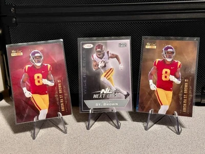 2021 Wild Card Matte Red Gold Chase Sage Silver Amon-Ra St. Brown RC #154 Rookie - Image 1 of 2