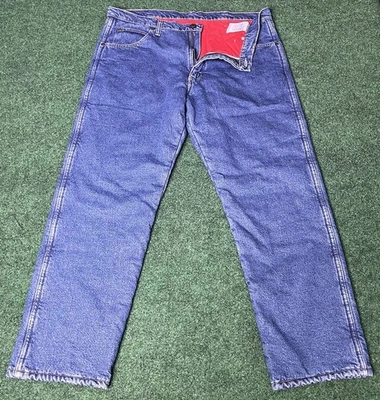 Wrangler 坚固耐磨绝缘牛仔裤 36x30 法兰绒红色衬里冬季工作服 — 第 1/4 张图片
