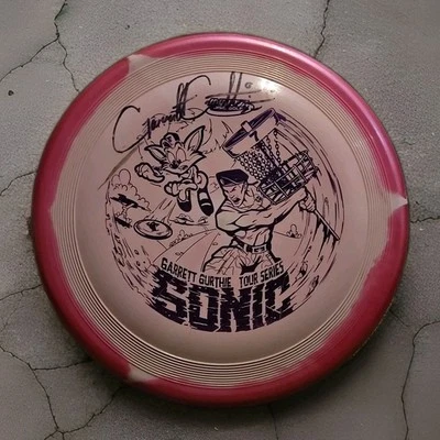 Garrett Gurthie Autographed Innova Sonic Tour Series Disc Golf - Dark Pink 174g - Image 1 of 4
