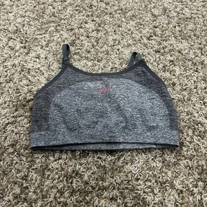Sujetador deportivo sin costuras gris con rosa Gymshark para mujer talla pequeña  - Imagen 1 de 2