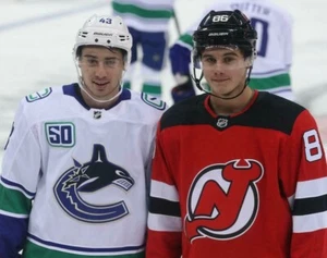 Quinn Hughes Jack Hughes NJ Devils Vancouver Canucks UNSIGNED 8x10 Photo (A) - Picture 1 of 1
