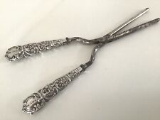 Antique silver Edwardian hair curling tongs circa 1903.
