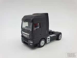 Herpa MAN TGX XXL Tractor dullblack lacquered Self-made /H15082 - Picture 1 of 1