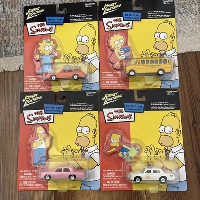 Johnny Lightning The Simpsons Set Of 4 Die-cast Cars - All New Sealed on Cards - Image 1 of 4