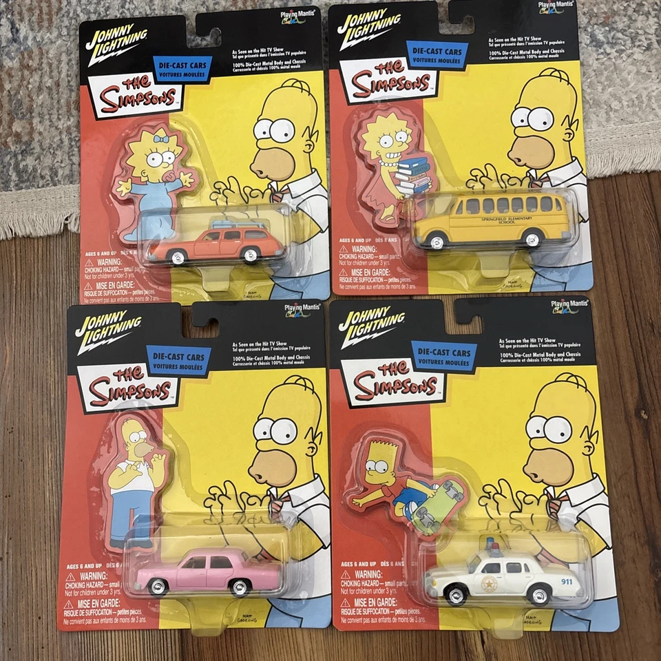 Johnny Lightning The Simpsons Set Of 4 Die-cast Cars - All New Sealed on Cards - Image 1 of 4