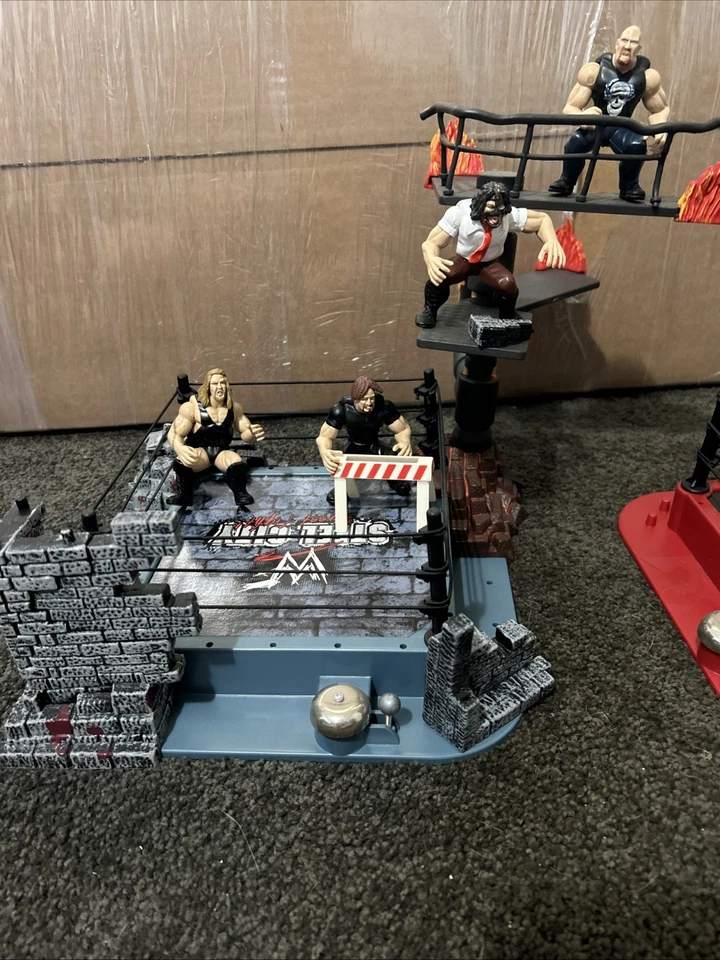 Lote de mini micro anillos WWF jakks Pacific Steel City Brawl 4 todos enterrados vivos Wwe Foto 1 de 4