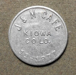 Kiowa, Colo., J & M Café 5c In Trade. Aluminum, 22mm - Picture 1 of 2