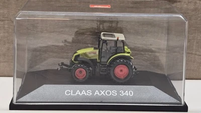 SCHUCO H0 1:87 Claas Axos 340 Traktor in PC-Vitrine - Bild 1 von 4