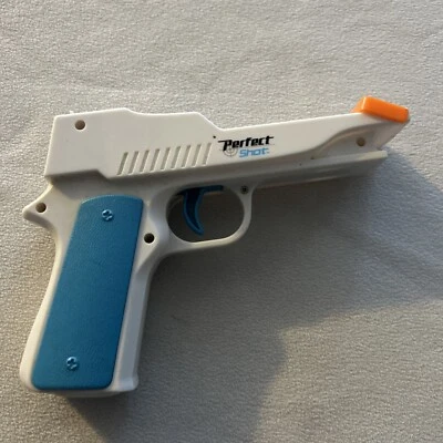 Nyko Perfect Shot Nintendo Wii White Gun with Orange Clip  - Image 1 of 4