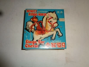 Vintage Monkey Riding Horse Tin Wind-up Toy w bell & key in Original Box. Works - Picture 1 of 5