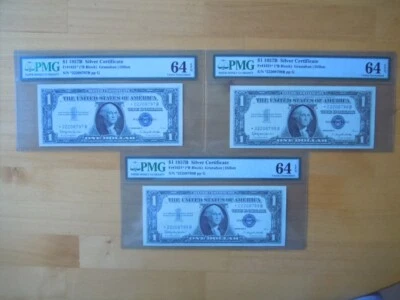 1957B (3) $1 Consecutive Blue Seal Silver Certificates Graded PMG 64 Choice Unc. - Image 1 of 4