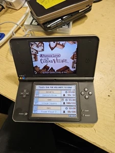 Nintendo DSi XL Black/Bronze - - Picture 1 of 21