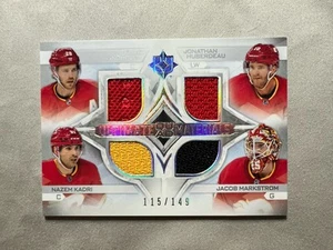 2023-24 UD Ultimate Quad Materials/149 CALGARY Kadri Lindholm - Picture 1 of 2