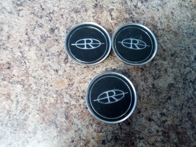 Buick Riviera 1979-1985 original OEM 15" cable tapacubos emblema GM OE  Foto 1 de 4