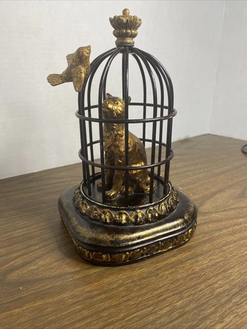 Vintage Cat inside Bird Cage With Bird On The Cage Cover