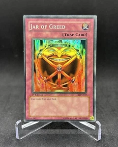 Yugioh Jar of Greed LON-047 Super Rare 1st Edition NM - Picture 1 of 2