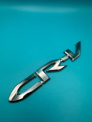 Fabricante de equipos originales Honda CR-V 2007-2011 emblema trasero insignia logotipo cromo CRV 75722-SWA-003 Foto 1 de 4