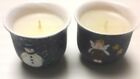 SET OF TWO CERAMIC CHRISTMAS VOTIVE CANDLES SNOWMAN AND ANGEL