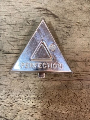 Calentador de aceite Perfection 770 - logotipo emblema Foto 1 de 4