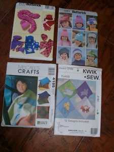 Lot 4 UNCut Craft Patterns Butterick Scarf, Hat- McCalls Lap Quilt- Holiday Flag - Picture 1 of 2