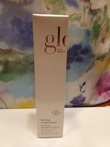 Glo Skin Beauty Primer ölfrei getönte Grundierung in Licht. Volle Größe, 50 ml/1,7 oz. - Bild 1 von 4