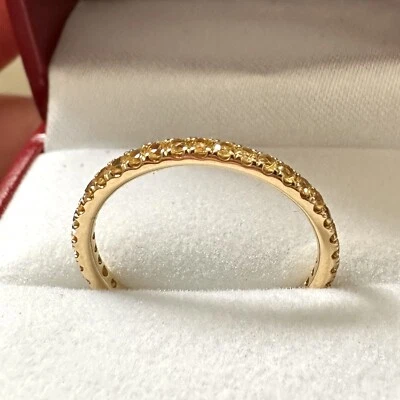 Banda de eternidad de zafiro amarillo de oro de 18k Foto 1 de 4