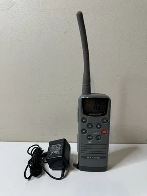 Radio marina VHF portátil estándar Horizon HX150S con adaptador Foto 1 de 4