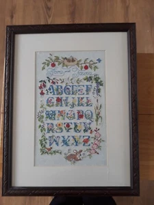 VINTAGE SAMPLER NEEDLEWORK IN GLAZED FRAME....SIZE OF FRAME IS 55CM X43CM.... - Picture 1 of 6