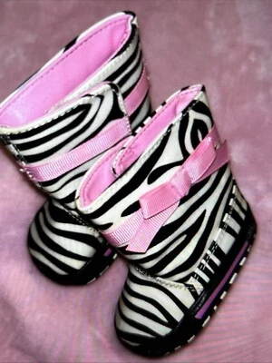 Botas de lluvia para bebé estampado de cebra con lazos rosas talla 1. Usado en excelente estado Foto 1 de 4