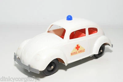USA O GERMANY PLASTICA PLASTICA PLASTICA VW VOLKSWAGEN BEETLE BEETLE RED CROS... - Immagine 1 di 4