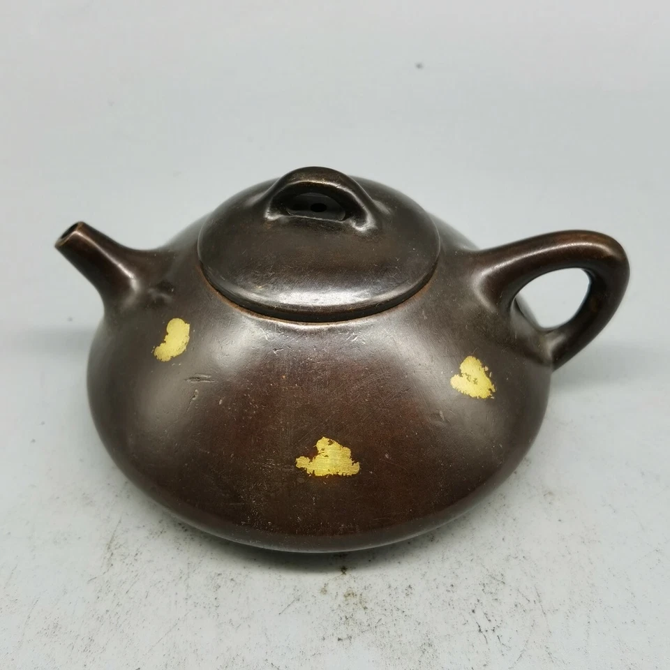Tetera china antigua púrpura cobre dorado punteado bronce tetera Foto 1 de 4