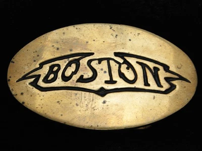 RC11167 HEBILLA DE CINTURÓN CONMEMORATIVA DE LATÓN MACIZO BANDA DE MÚSICA *BOSTON* VINTAGE AÑOS 70 Foto 1 de 2