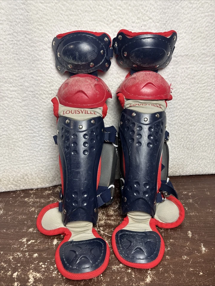 Louisville Slugger Youth PG Series 5 Catcher's Leg Guards Gear Navy Red Good - Image 1 of 4