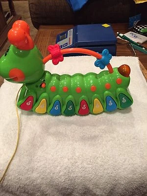 Navystar Pull-A-Long Musical Iluminado Alfabeto Gusano-10"x7"x3" Foto 1 de 4