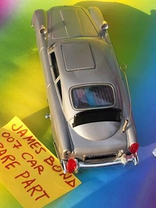 Blechspielzeug 1965 ASC-Japan 007 JAMES BOND ASTON MARTIN Rücklicht Ersatzteil. - Bild 1 von 7