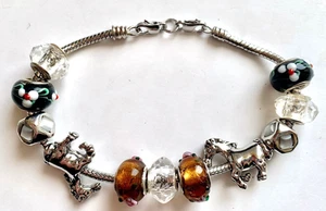 Silver tone bracelet with beaded charms Glass Horses. - Picture 1 of 3